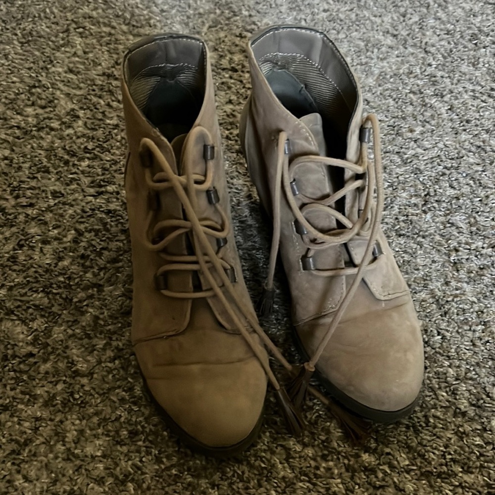 Woman’s lace up wedge bootie